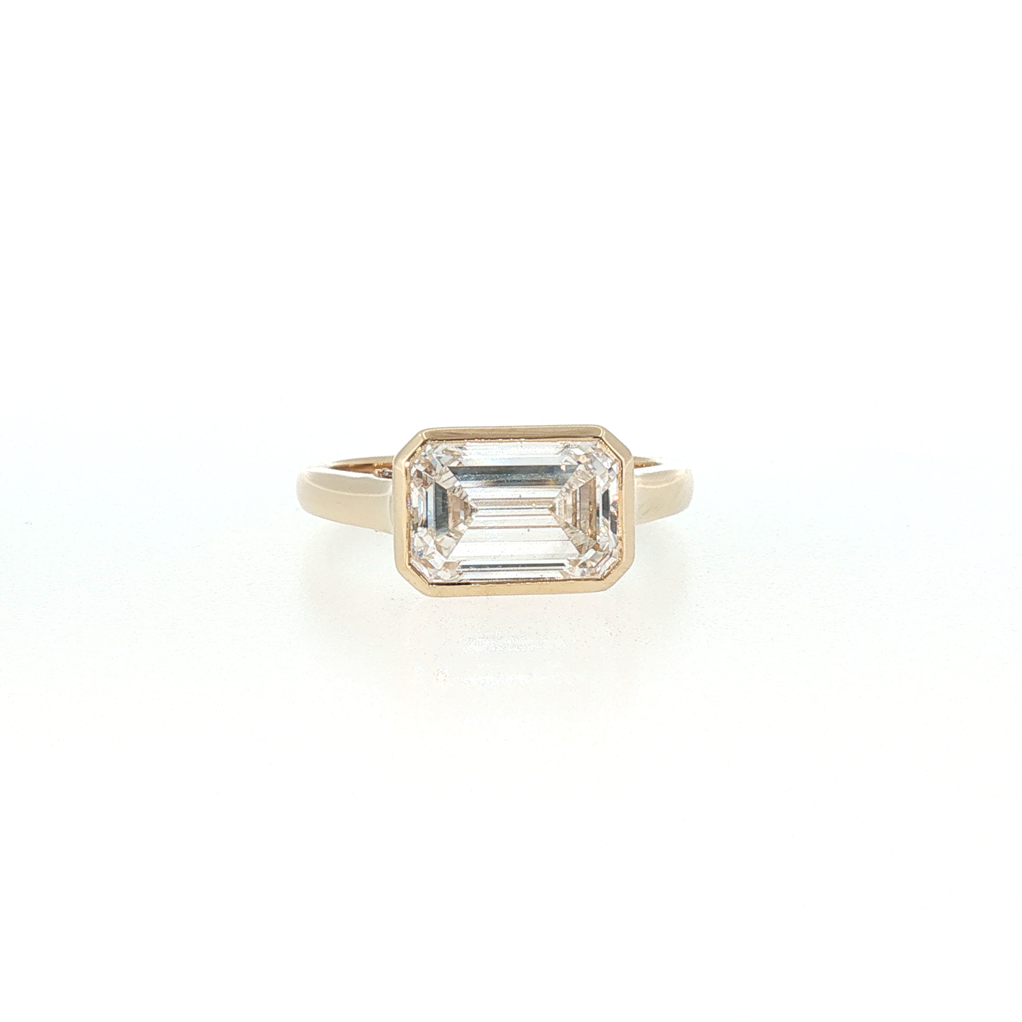 Yellow Gold Emerald-Cut Diamond East West Bezel Set Ring