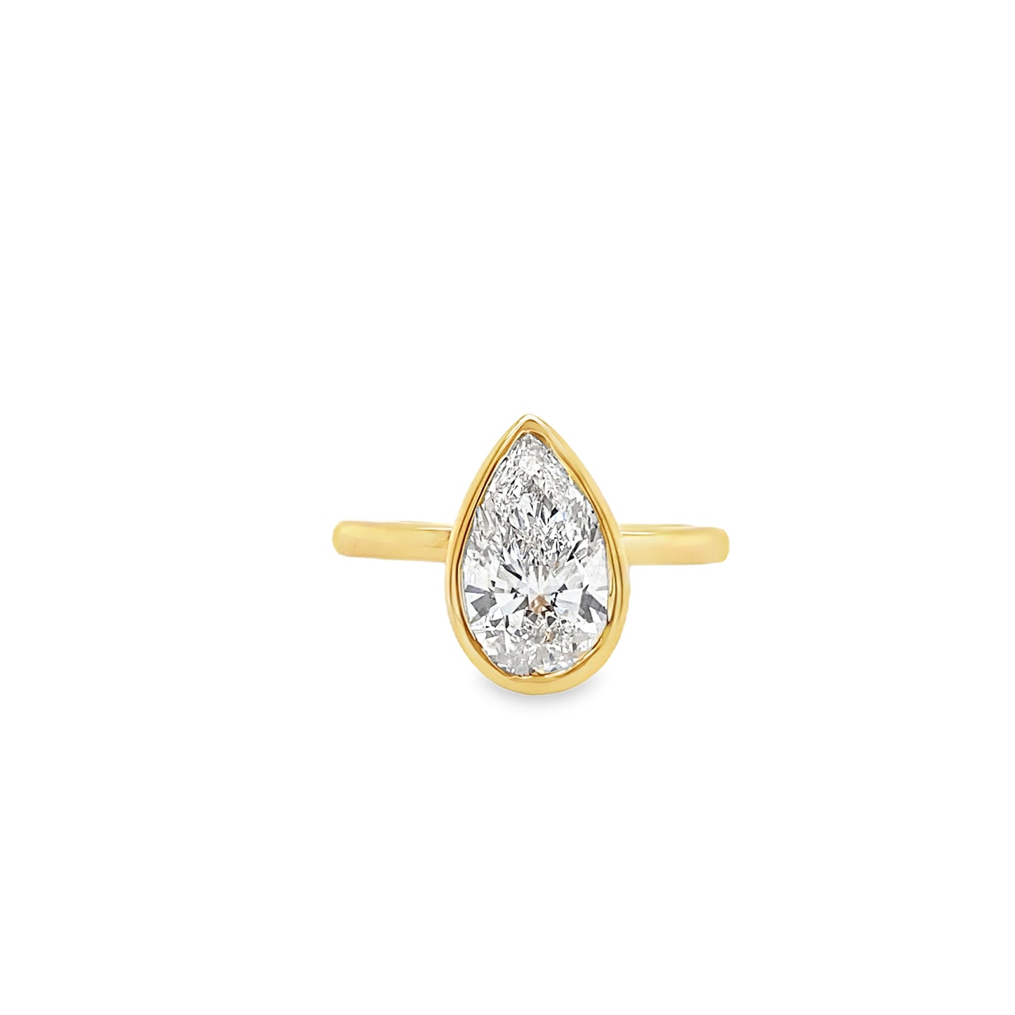 Yellow Gold Pear Cut Diamond Bezel Solitaire Ring