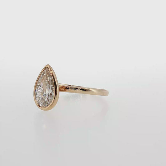 Yellow Gold Pear Cut Diamond Bezel Solitaire Ring